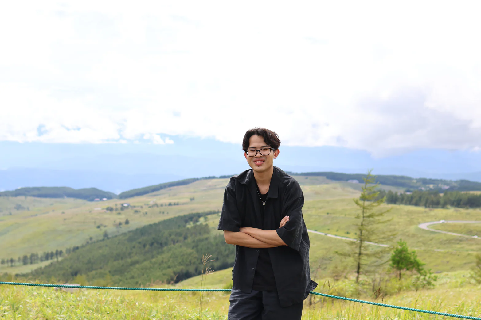 Yuto Matsui against the mountains and highlands of Nagano